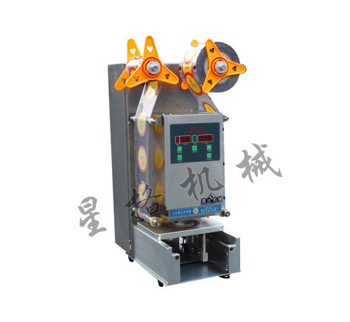 口杯自動(dòng)封蓋機(jī)(全不銹鋼)(圖1)